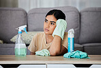 House, cleaning and bored woman thinking, tired and annoyed with household task, sad and frustrated. Lazy, cleaner and indian girl contemplating, daydream and distracted from bacteria or dust cleanup