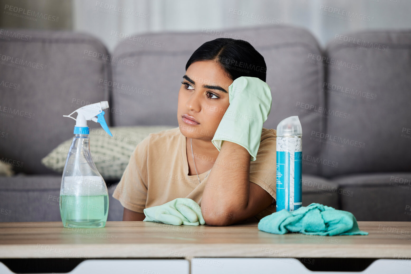 Buy stock photo House, cleaning and bored woman thinking, tired and annoyed with household task, sad and frustrated. Lazy, cleaner and Indian girl contemplating, daydream and distracted from bacteria or dust cleanup