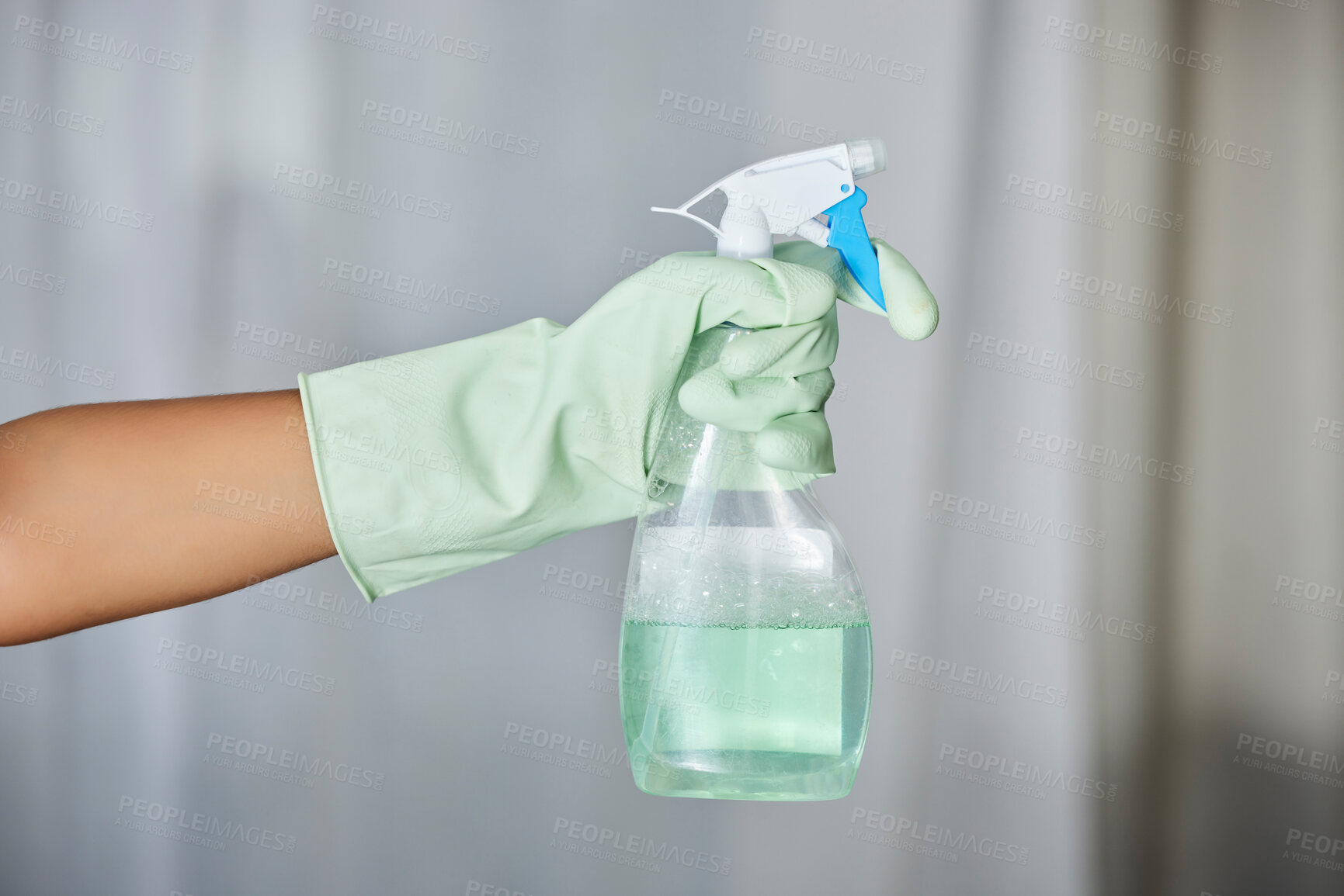 Buy stock photo Spray bottle, detergent and maid with gloves for cleaning in a house, office or apartment. Hygiene, cleaner service and hand of a housekeeper with liquid for housework or sanitize dust, dirt or germs