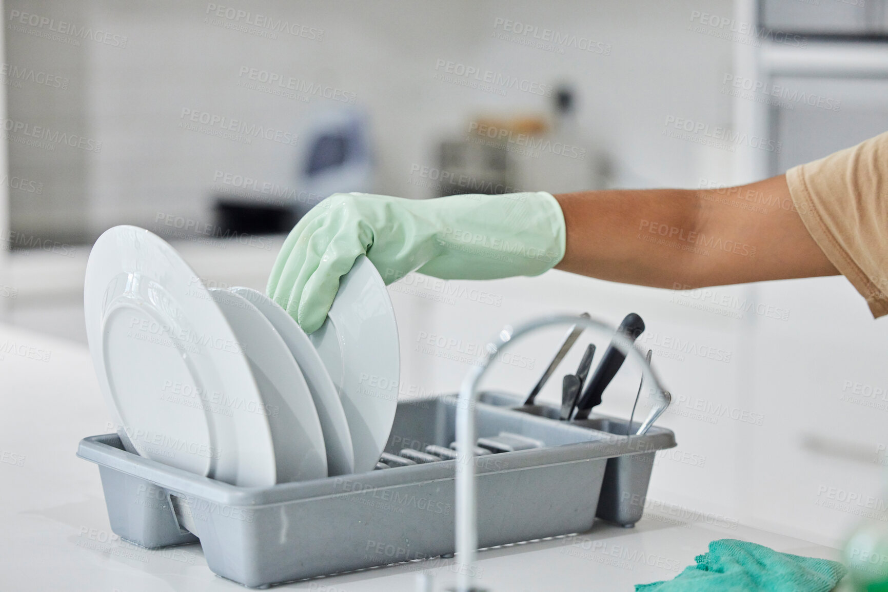 Buy stock photo Woman hand, plate dishes and sink in kitchen for washing, cleaning and hygiene in house chores with gloves. Cleaner lady, hand and home for clean, stop bacteria and service for wellness in apartment