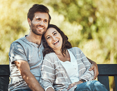 Buy stock photo Couple, love and hug on park bench, laughing at funny joke or comic comedy and having fun together outdoors. Valentines day, romance relax and portrait of man and woman hugging on romantic date.