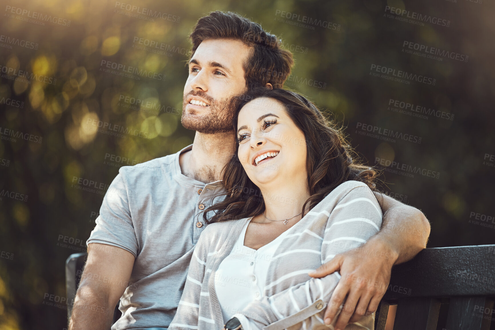 Buy stock photo Love, couple and hug on park bench, laughing at funny joke or comic comedy and having fun together outdoors. Valentines day, romance relax and man and woman thinking and embrace on romantic date.