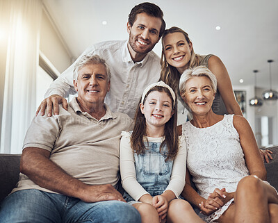 Buy stock photo Big family, smile and portrait on sofa in home living room, bonding and enjoying quality time together. Love, care and happy grandparents, father and mother with girl, child or kid relaxing on couch.