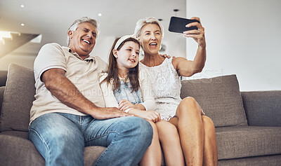 Buy stock photo Selfie, love or happy grandparents with girl in living room bonding as a family in Australia taking pictures. Smile, senior or elderly man relaxing with old woman or child at home together on holiday