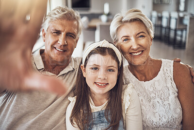 Buy stock photo Selfie, portrait or happy grandparents with girl in living room bonding as a family in Australia with love. Pictures, smile or elderly man relaxing old woman with child at home together on holiday 