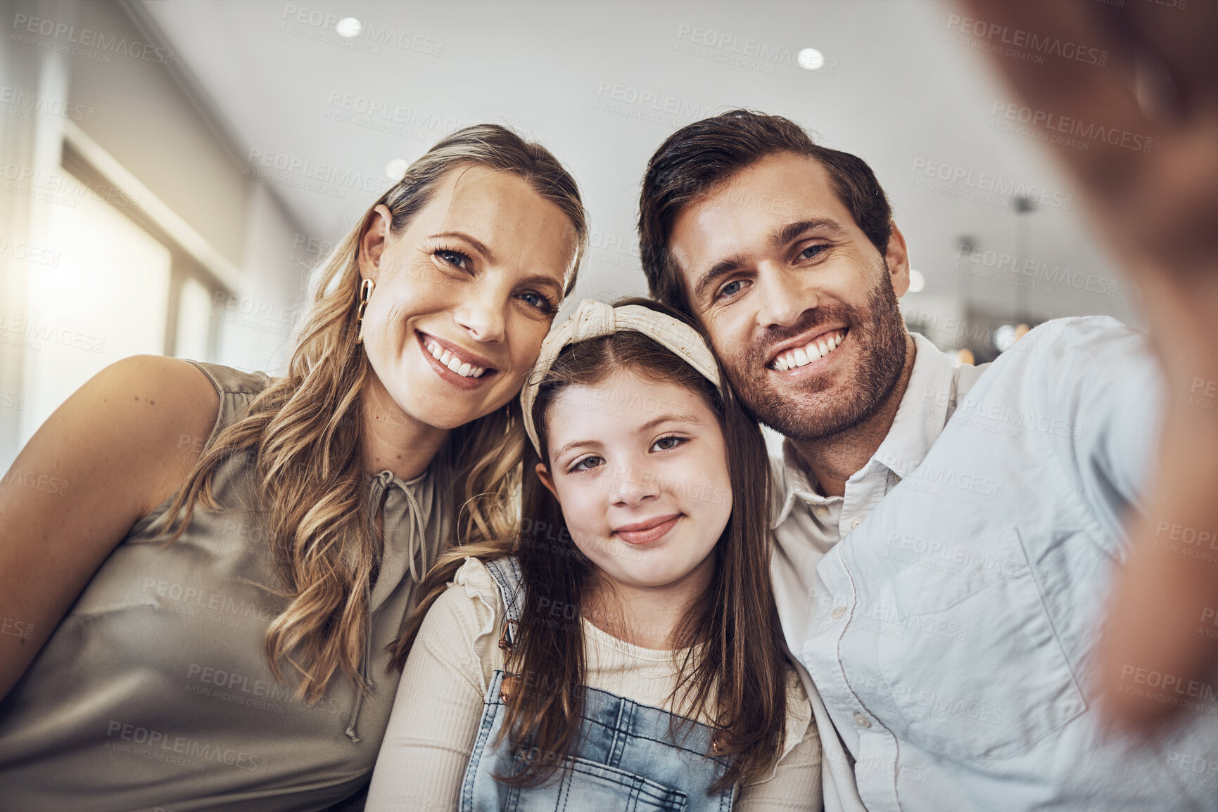 Buy stock photo Portrait, mother or father with a girl take a selfie as a happy family in living room bonding in Australia. Child, smile or parents relaxing with a smile enjoying quality time taking lovely pictures 