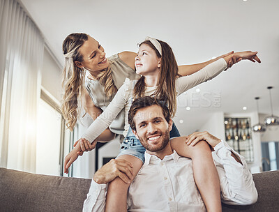Buy stock photo Happy family, bonding or airplane game in living room, house or relax home in freedom activity, energy or fun play games. Smile, parents or child in flying on father shoulders in fantasy or support