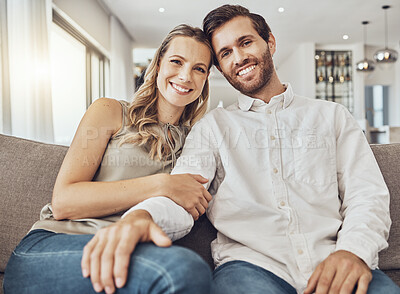 Buy stock photo Couple. portrait and home of young people together on a living room couch with love and care. Happiness, smile and hug of a man and woman on a sofa feeling relax in a house lounge with marriage