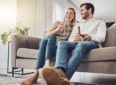 Buy stock photo Love, couple on sofa and alcohol to relax, smile and bonding on weekend break, loving and romantic. Romance, man and woman with beer, champagne and celebrate achievement, happiness and in living room