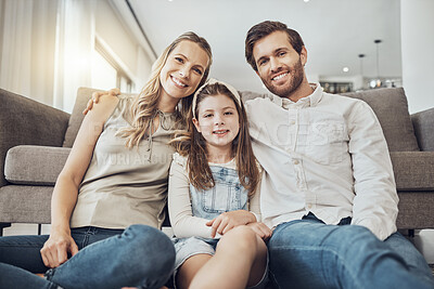 Buy stock photo Portrait, mother or father with a kid to relax as a happy family in living room bonding in Australia with love or care. Hugging, trust or parent smile with girl enjoying quality time on a fun holiday