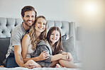 Portrait, mother or father hugging a girl to relax as a happy family in bedroom bonding in Australia with love or care. Morning, embracing or parents smile with kid enjoying quality time on holiday