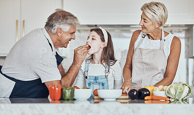 Buy stock photo Love, grandparents or girl cooking or eating as a happy family in house kitchen with organic vegetables for dinner. Grandmother, old man or young child bonding or helping with healthy vegan food diet