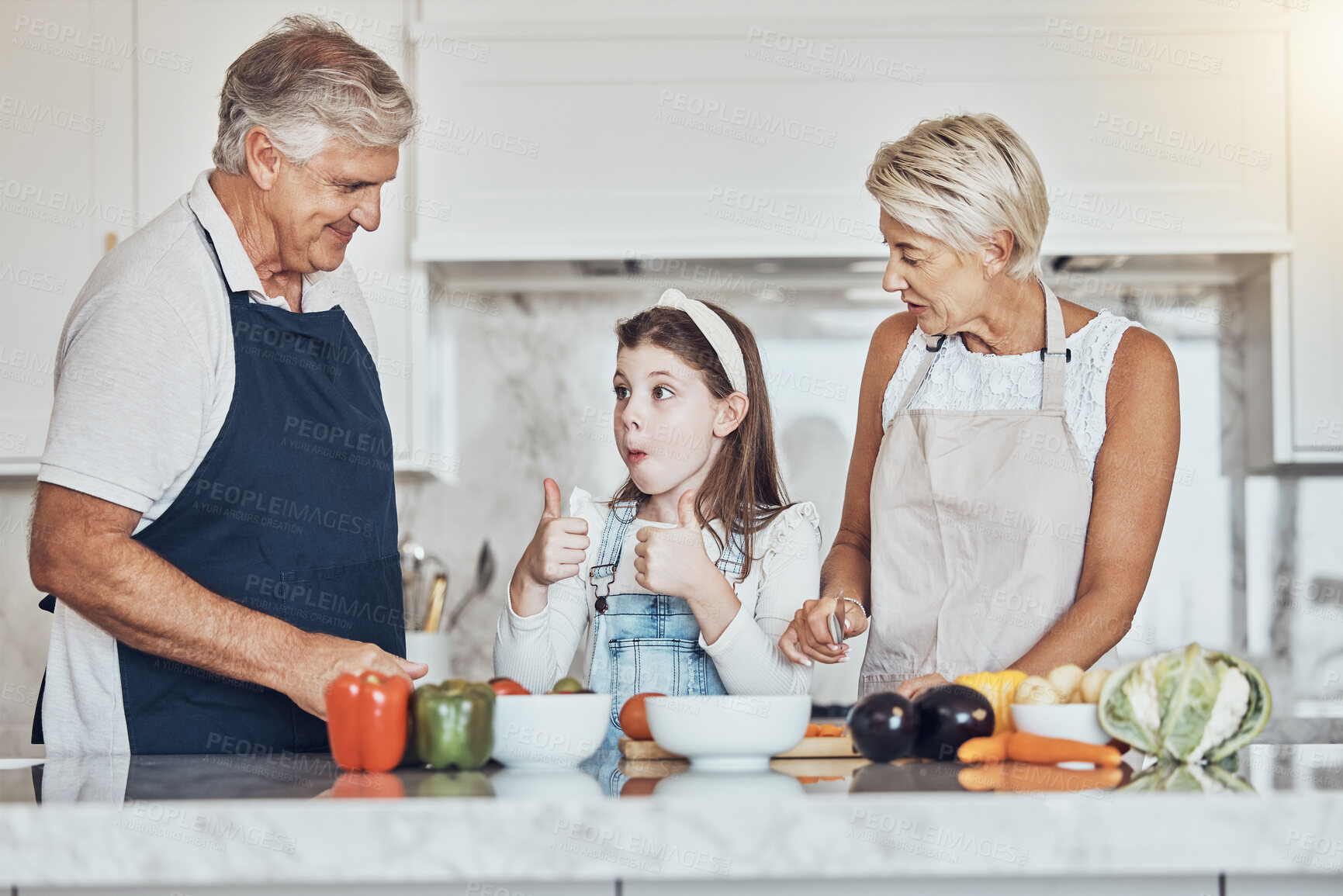 Buy stock photo Thumbs up, grandparents or child cooking in kitchen as a happy family in a house with healthy vegetables at dinner. Grandmother, old man or girl with a yes, like or good hand sign helping with diet