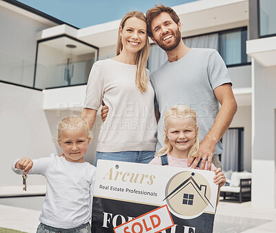 Buy stock photo Real estate, house and portrait of family with keys and a sign for moving, property and homeowner. Happy, showing and parents with children, board and relocation after buying a new home from realtor