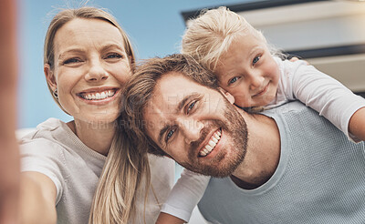 Buy stock photo Selfie, happy and portrait of a family at their house after moving, relocation and buying a home. Real estate, mortgage and face of a mother, father and child with a photo outside of a new apartment