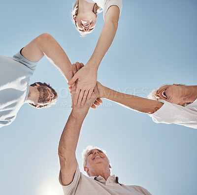 Buy stock photo Happy family, hands together and smile below in trust, community or support for agreement outdoors. Group in teamwork collaboration stack hand for partnership, achievement or bonding in solidarity