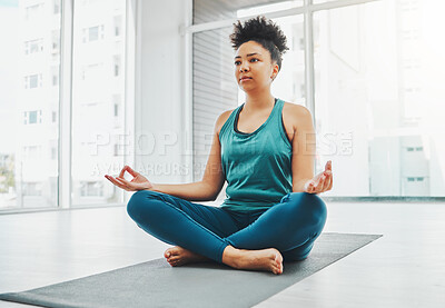 Buy stock photo Yoga, black woman and meditation with lotus exercise for fitness, peace and wellness. Young person in health studio for holistic workout, mental health and body balance with zen energy to relax
