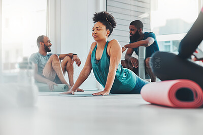 Buy stock photo Black woman, yoga and meditation class with exercise for fitness, peace and wellness. Group of people in gym studio for holistic workout, mental health and body balance with zen mind and energy