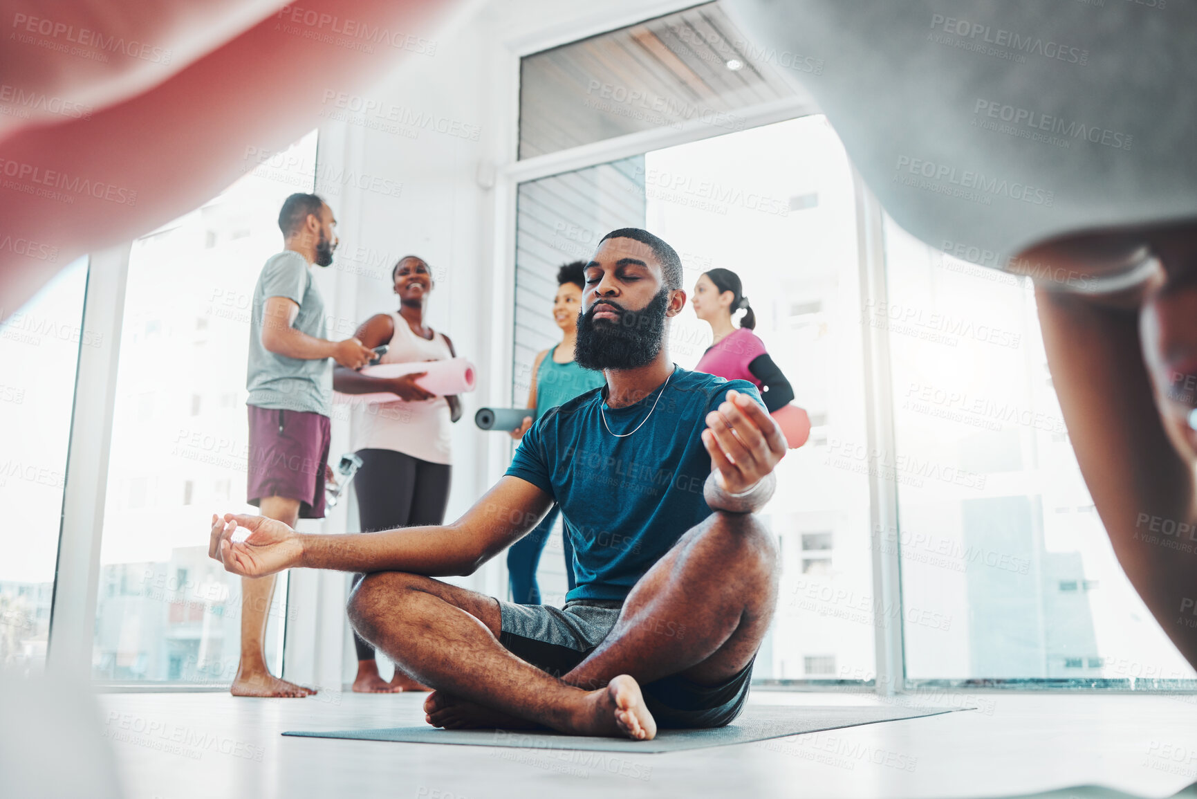 Buy stock photo Yoga, meditation and black man do lotus exercise for fitness, peace and wellness in class. Young sports person in health studio for holistic workout, mental health and body balance with zen energy