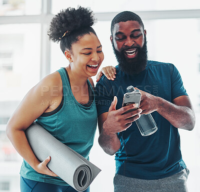 Buy stock photo Phone, meme or yoga friends on social media laughing at funny online content after a fitness class. Pilates, black woman and happy African personal trainer relaxing or enjoying crazy comedy together