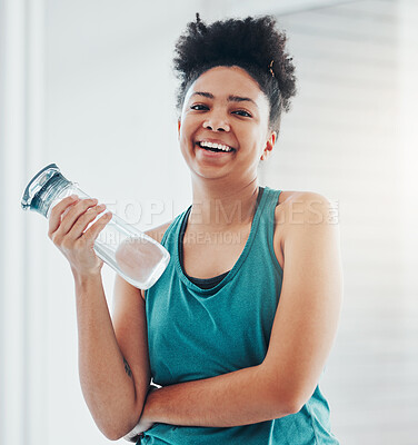 Buy stock photo Portrait, fitness and water with a sports black woman staying hydrated during her cardio or endurance workout. Exercise, training and wellness with a female athlete holding a bottle for hydration