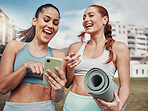 Yoga, fitness and phone with woman friends in the park together for mental health exercise. Exercise, social media and training with a female and friend outside on a grass field for a summer workout