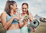 Yoga, fitness and social media with woman friends in the park together for mental health exercise. Exercise, phone and training with a female and friend outside on a grass field for a summer workout