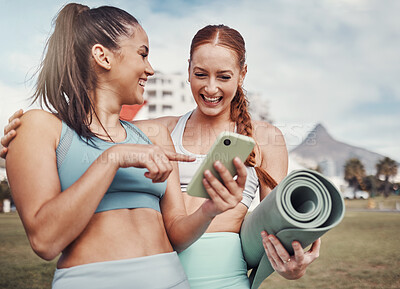 Buy stock photo Yoga, fitness and social media with woman friends in the park together for mental health exercise. Exercise, phone and training with a female and friend outside on a grass field for a summer workout
