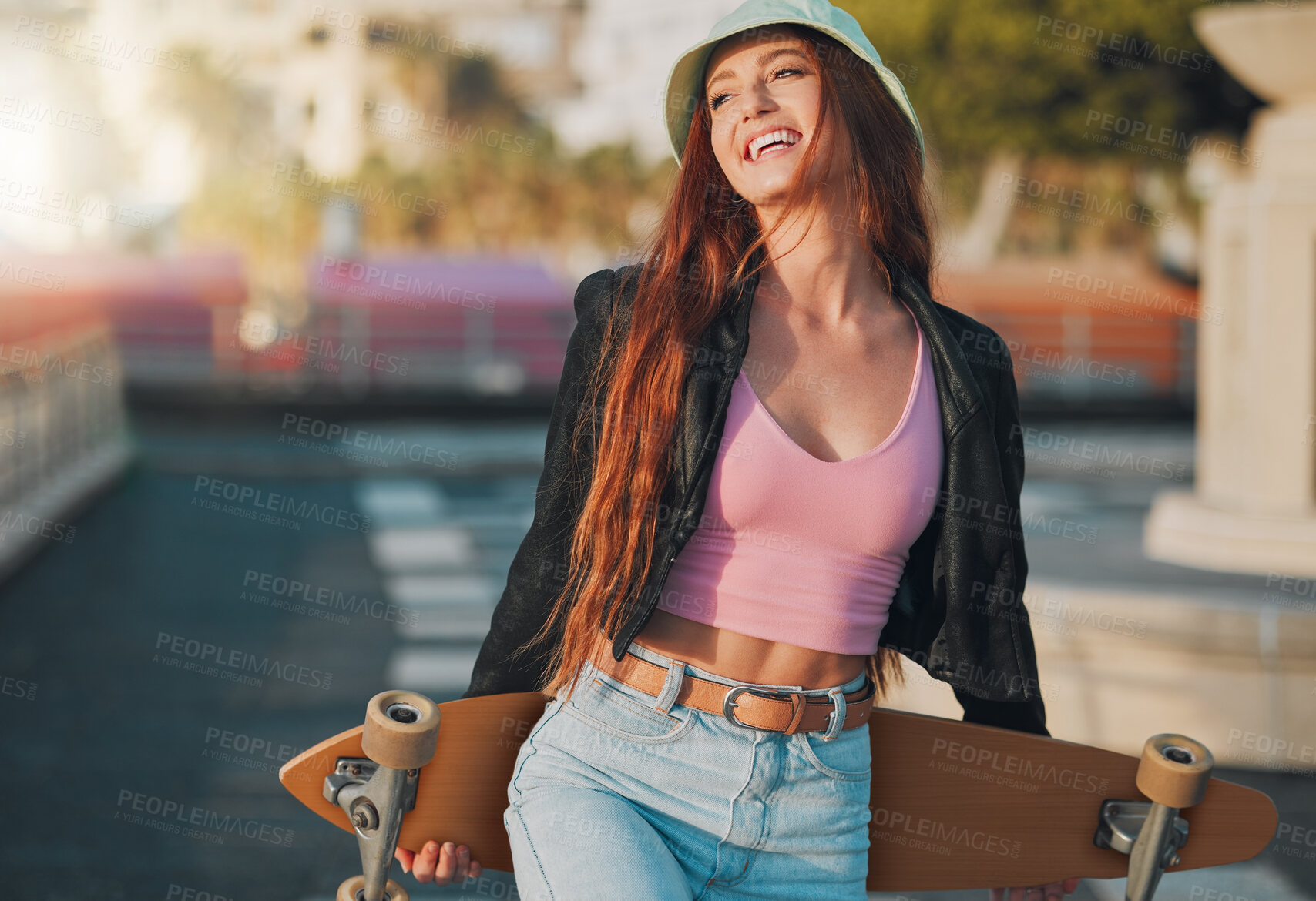 Buy stock photo Summer, happy and skateboard with woman in city for freedom, sports and relax lifestyle. Training, fitness and sunset with girl walking in urban town enjoying adventure, wellness and energy vacation
