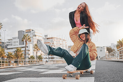 Buy stock photo Fun, comic and portrait of friends on a skateboard for the weekend, bonding and playing in the city. Energy, smile and crazy women skateboarding for funny activity, happiness and playful in Sweden