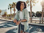 Black woman, scooter and sustainable travel in city, adventure and sunshine with happiness outdoor. Eco friendly transportation, freedom with carbon footprint and transport in urban street in Miami