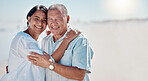 Senior couple, beach and portrait of love, relax and mockup on summer holiday, vacation or date. Happy retirement, man and woman hug at ocean for happiness, support or smile together in calm sunshine