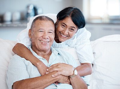 Buy stock photo Hug, love and senior couple portrait for happiness, gratitude and care on the living room sofa. Affection, happy and elderly man and woman on couch to relax during retirement freedom in the lounge