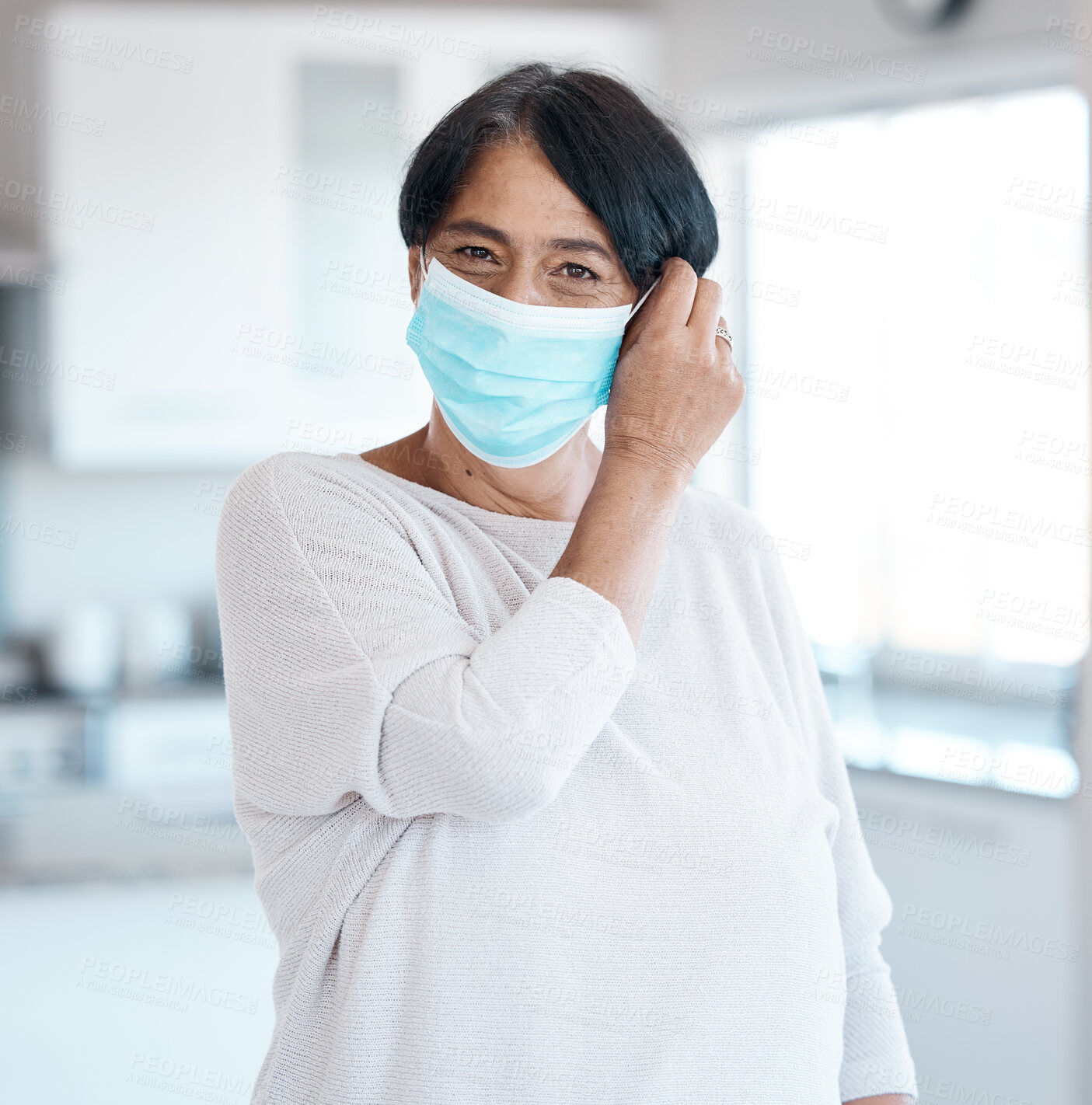 Buy stock photo Senior woman, Covid and healthcare, face mask removal and portrait at home, end of health rules and safety from virus. Retirement, wellness and compliance, protection and hygiene to stay healthy