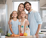 Portrait of parents and children cooking with vegetables in kitchen for lunch, dinner or meal prep ingredients. Family, food and smile of mom, dad and girls learning, teaching and helping at home