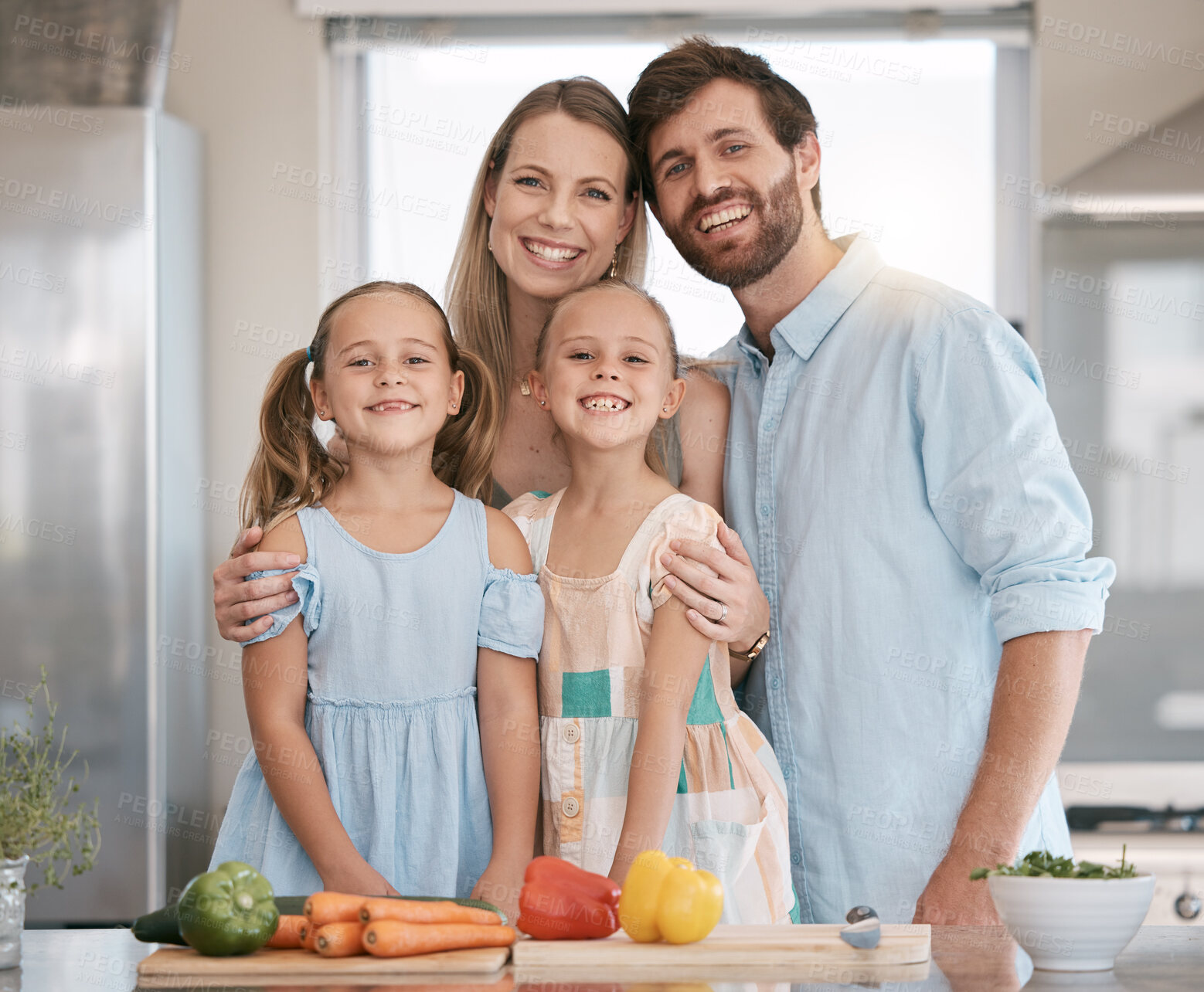 Buy stock photo Portrait of parents and children cooking with vegetables in kitchen for lunch, dinner or meal prep ingredients. Family, food and smile of mom, dad and girls learning, teaching and helping at home