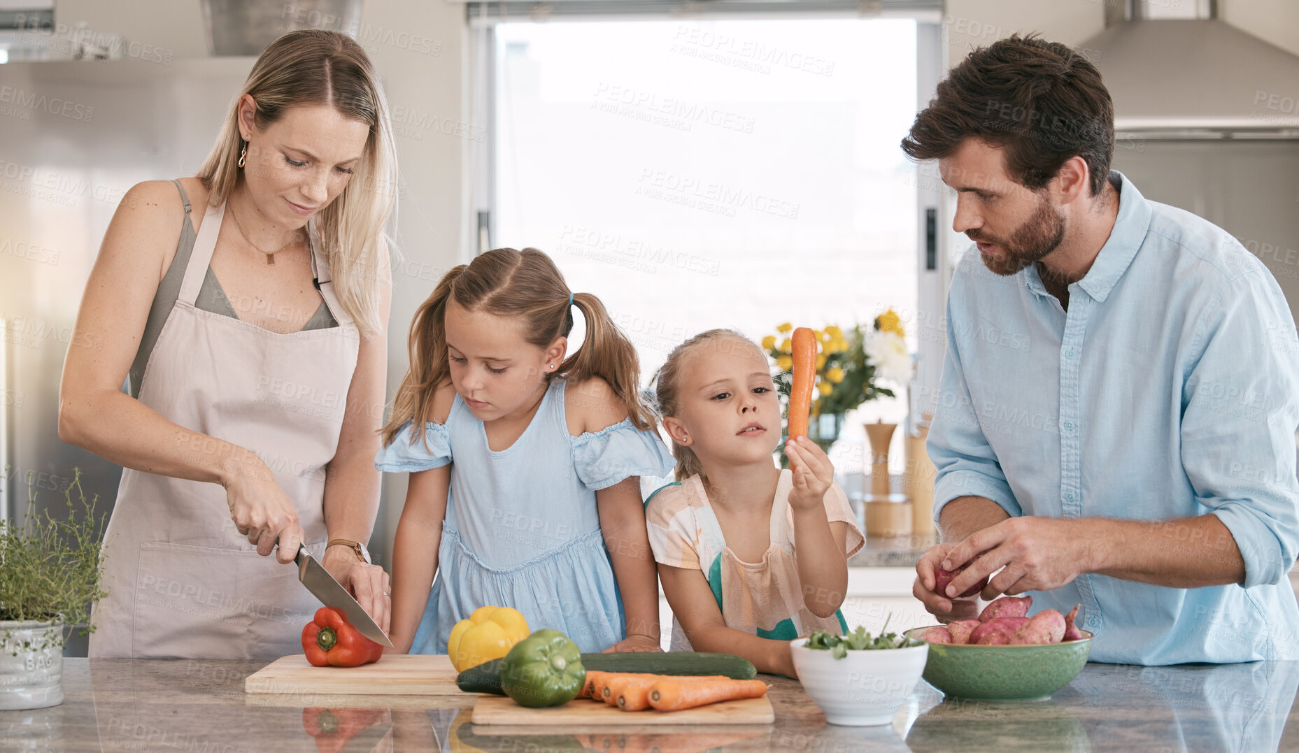 Buy stock photo Parents, food and children cooking in kitchen with vegetables for nutrition, vegan lifestyle and healthy eating. Food, family and mom, dad and girls learning and help for meal prep, dinner or lunch