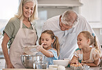 Family, baking and children helping grandparents in their home kitchen. Senior woman, man and girl kids learning about food, cooking or dessert recipe with love, care and quality time for development