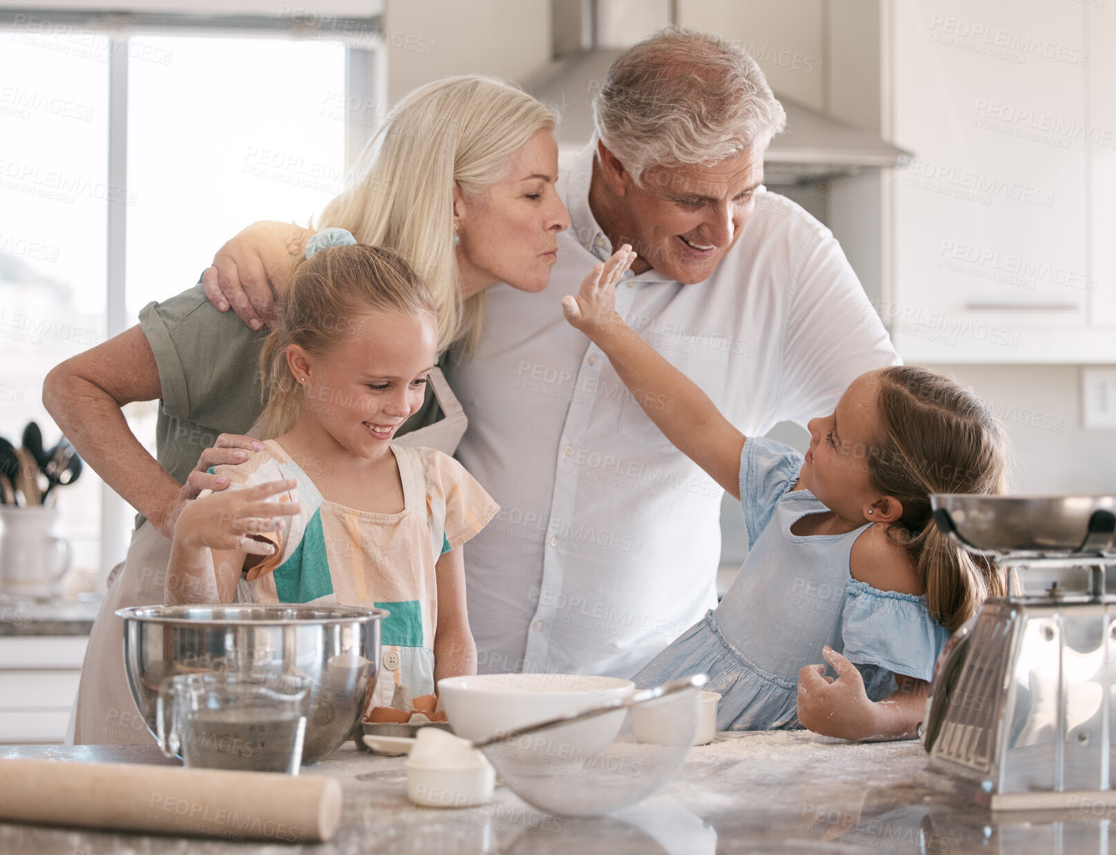 Buy stock photo Happy family, baking and children helping grandparents in home kitchen with food. Woman, man and girl kids learning to make cookies, pancakes or cake for breakfast with love, care and teamwork