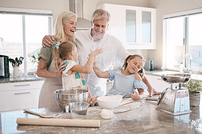 Buy stock photo Family, baking and high five with children helping grandparents in home kitchen. Woman, man and girl kids learning to make cookies, pancakes or cake using flour with love, care and teamwork for food