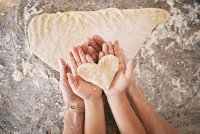 Buy stock photo Top view, hands and heart with parent baking with kid, teaching and bonding together, weekend break and loving. Love, family or in kitchen with dough, love or child development with skills or support