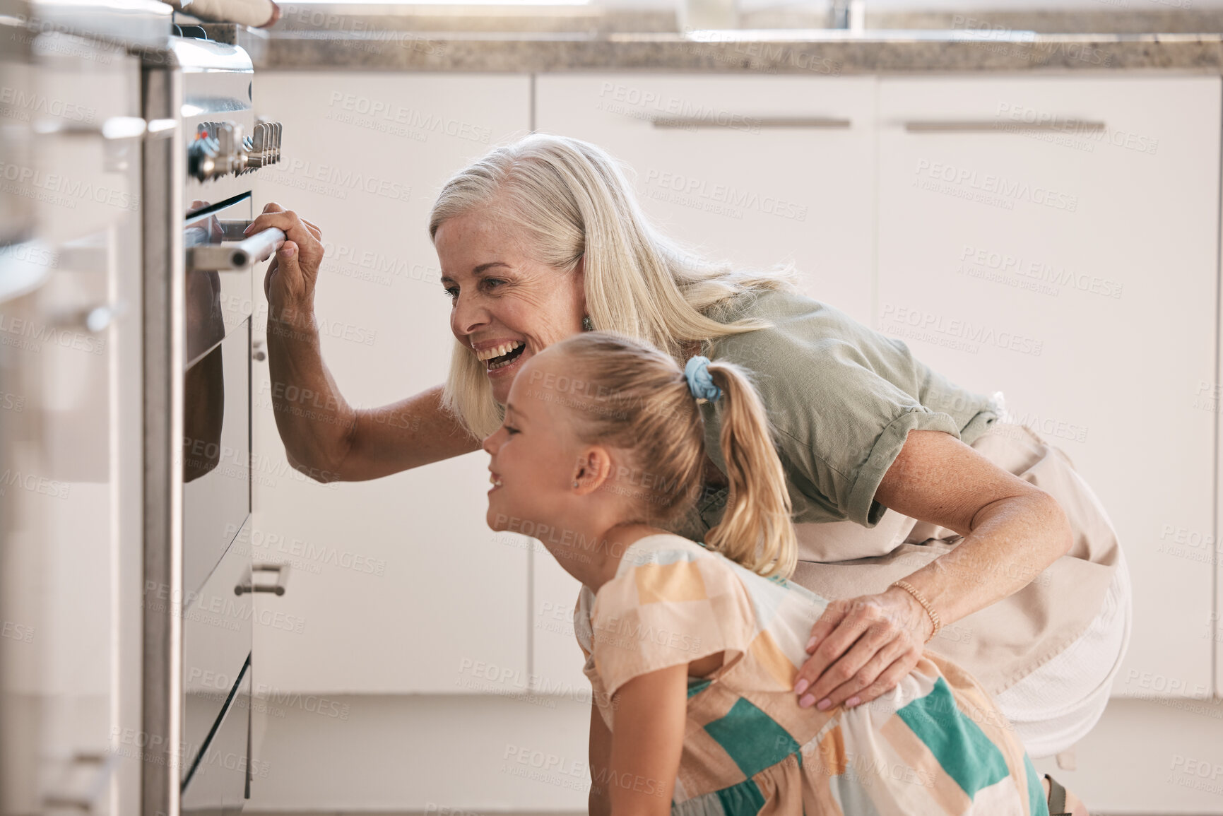 Buy stock photo Child, girl or oven baking with grandparent, senior or elderly woman in kitchen, bonding house or family home. Happy excited or waiting cooking kid with grandmother in dessert, cake or food learning