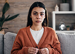 Portrait, mental health and therapy with a black woman patient in an office, sitting in an office to talk about depression. 