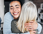 Love, comfort and woman hugging her mother for support, peace or consoling in their family home. Happy, smile and young lady embracing her mature mom with care, happiness and affection at their house