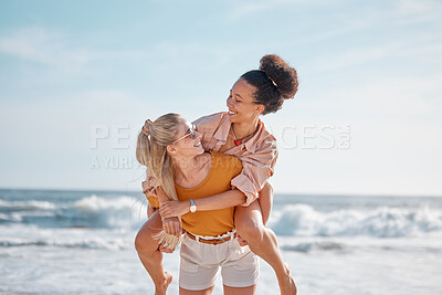 Buy stock photo Piggyback, ocean and happy couple of friends for lgbtq, lesbian or love and freedom on summer vacation together. Blue sky, beach and diversity women on date, fun support or excited valentines holiday