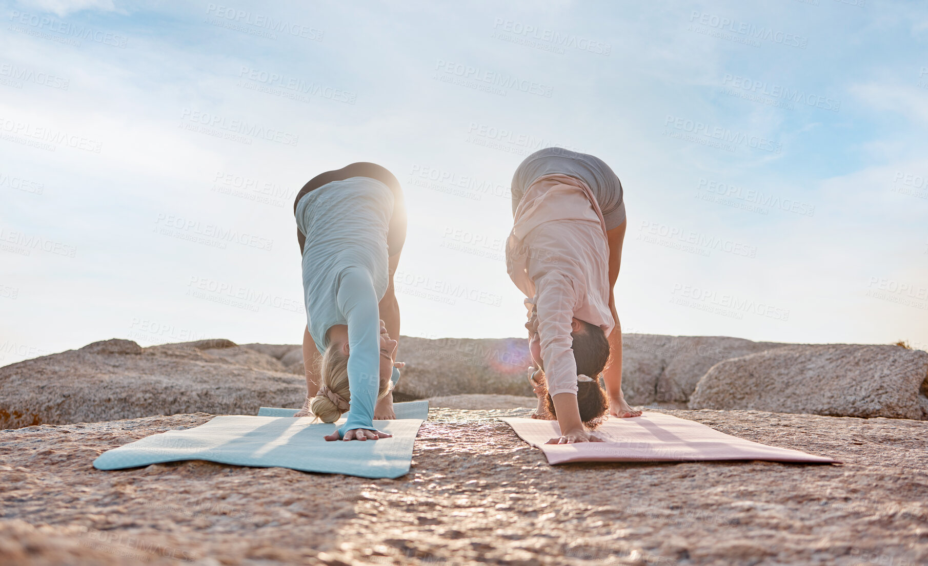 Buy stock photo Yoga, exercise and woman friends on the beach together for mental health, wellness or balance in summer. Exercise, diversity or nature with a female yogi and friend outside for health or mindfulness