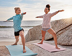 Yoga, fitness and woman friends stretching on the beach together for mental health or wellness in summer. Exercise, diversity or nature with a female yogi and friend practicing meditation outside