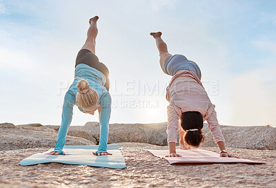 Buy stock photo Yoga, stretching and fitness with friends on the beach together for mental health or wellness in summer. Exercise, diversity or nature with a woman yogi and friend outside for inner peace or balance