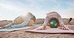 Yoga, women or child pose on rock mat in workout, training or bonding exercise for back pain. Relax, stretching or yogi friends in beach, nature pilates or fitness flexibility for healthcare wellness