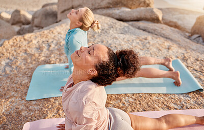 Buy stock photo Yoga, wellness and woman friends on the beach together for mental health or balance in summer from above. Exercise, diversity or nature with a female yogi and friend practicing meditation outside